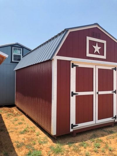 For sale: A 10x16 Lofted Barn with a star on it.