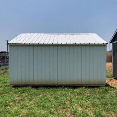 This 10x16 Garden Shed, available for sale near me, is a pristine structure with a metal roof. Situated in a vast field, it exudes simplicity and elegance. Get this 10x16 Garden Shed on sale today.