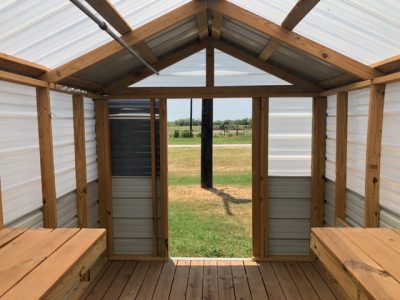 The 8x16 Greenhouse Shed with a wooden floor available for purchase at a shed store near me.