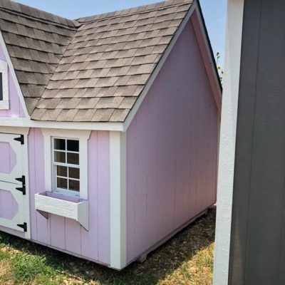 For sale: An 8x12 Victorian Playhouse with a white roof.