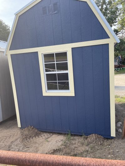 For sale shed: An 8x10 Lofted Barn with a yellow window.
