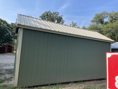 A 10x20 Chalet Shed with a sign on it, available for purchase at the nearest shed store.