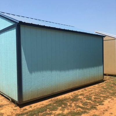 Two 10x16 Garden Sheds for sale sitting in a field.