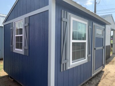 Need a 10x12 Garden Shed for your backyard? Check out our blue shed with white shutters and windows. We have sheds on sale at our store near you!