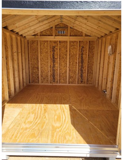 A 10x12 Utility Shed with wood flooring, available for sale.