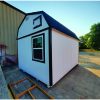 Looking for 12x16 Lofted Barn Sheds on sale? Visit our shed store near me to find a white and black 12x16 Lofted Barn Shed with a black roof.