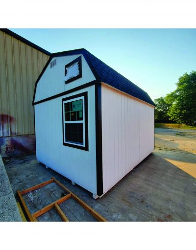 Looking for 12x16 Lofted Barn Sheds on sale? Visit our shed store near me to find a white and black 12x16 Lofted Barn Shed with a black roof.