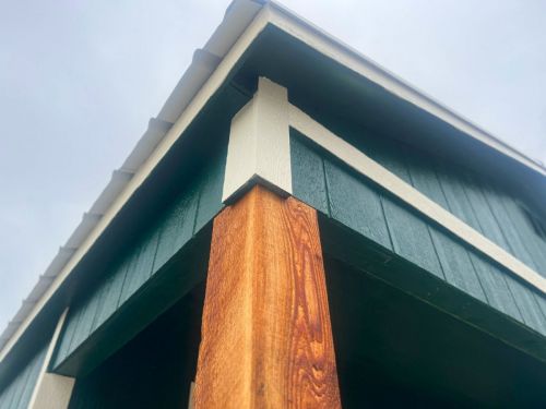 green cabinette shed wood column