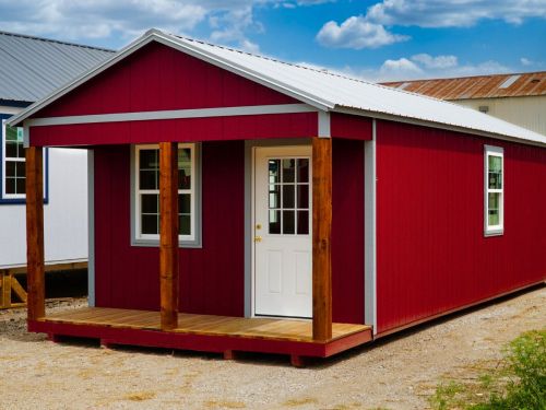 red cabinette shed with porch